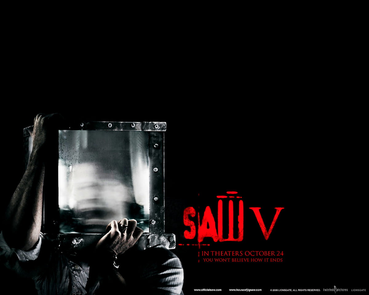 Person in dark (scene from film "Saw") / free wallpaper