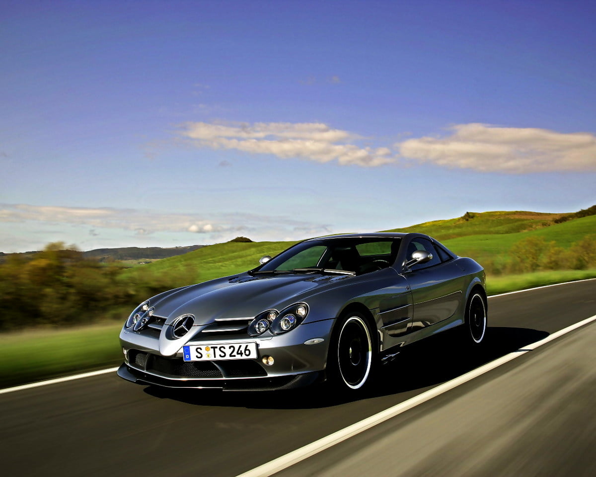 Mercedes driving on road — HD wallpaper 1280x1024