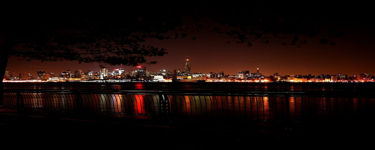 Large bridge lit up at night - backgrounds