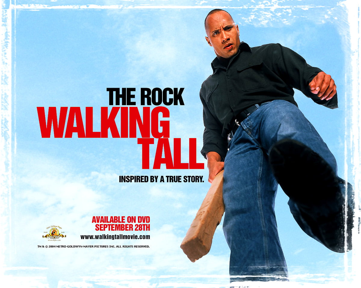 Dwayne Johnson holding sign (scene from film "Walking Tall") / free background 1280x1024
