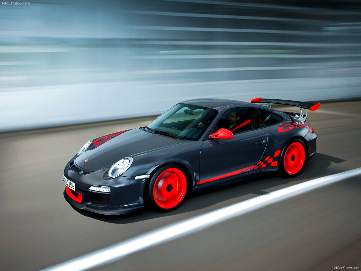 Porsche driving on road : wallpaper