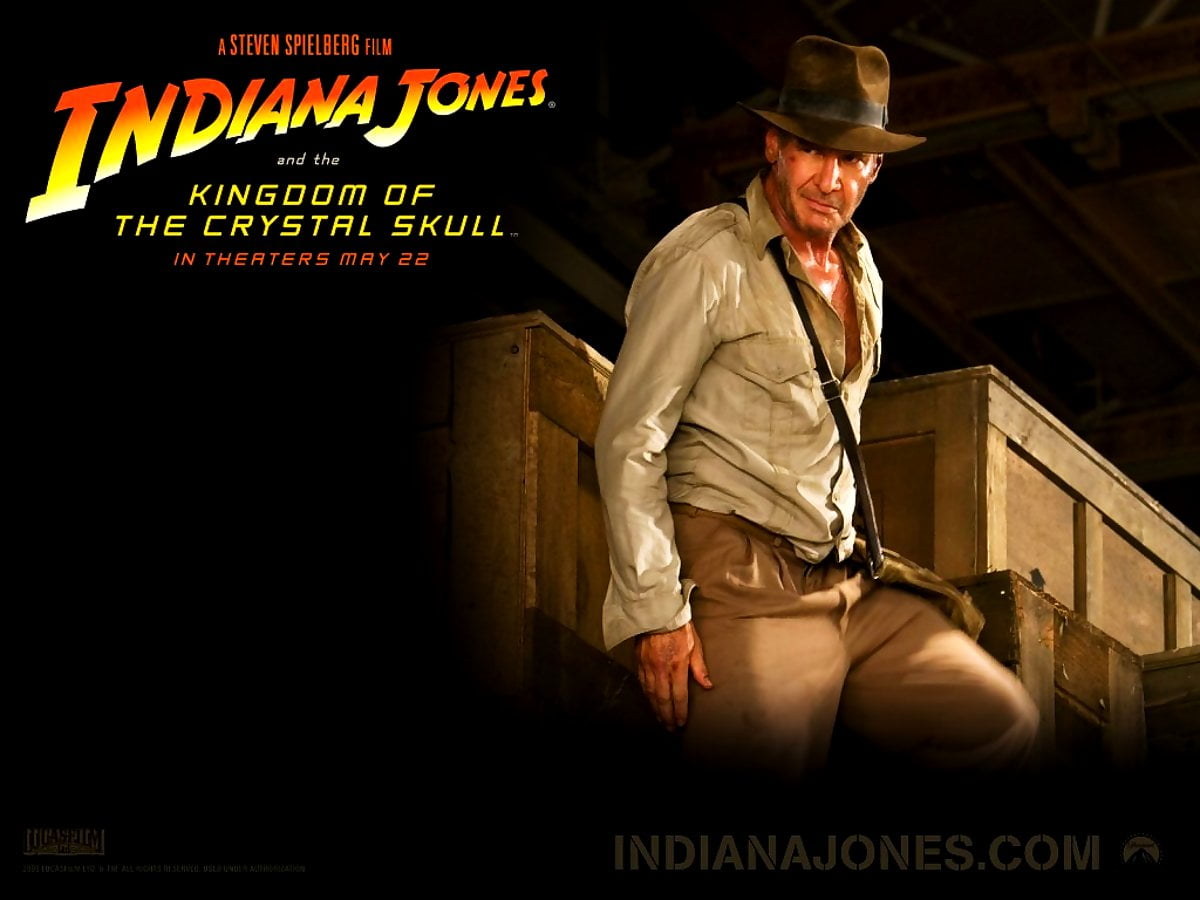 Backgrounds / person holding sign (scene from film "Indiana Jones") 1024x768