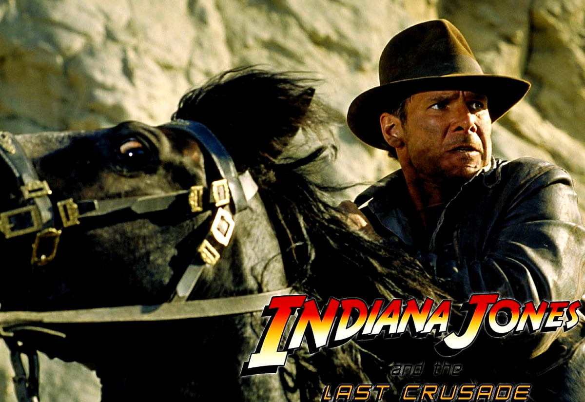 Homme debout à côté de cheval (scène du film "Indiana Jones") : HD fond d'écran 1600x1100